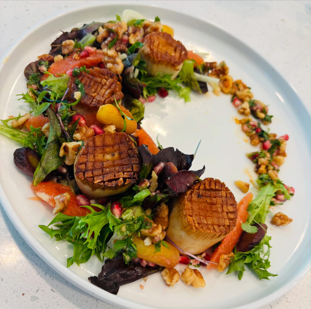 Vegan mushroom “scallops”, citrus salad, pomegranate gremolata