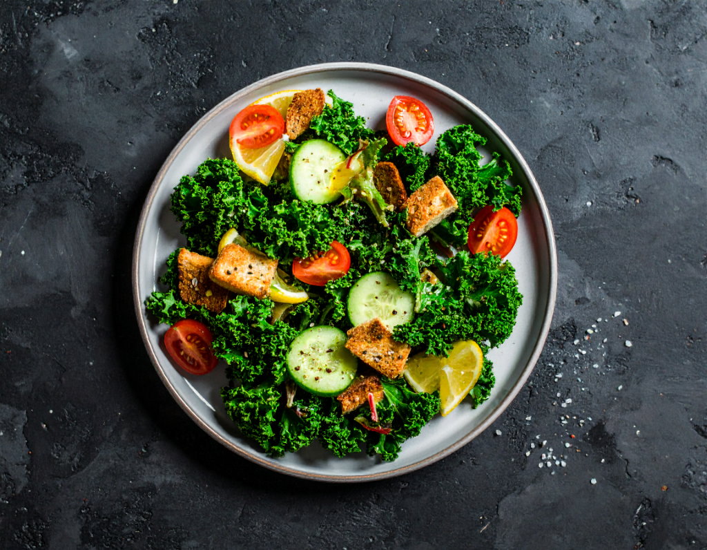 Plant Based "Chicken" Baby Kale Caesar Salad